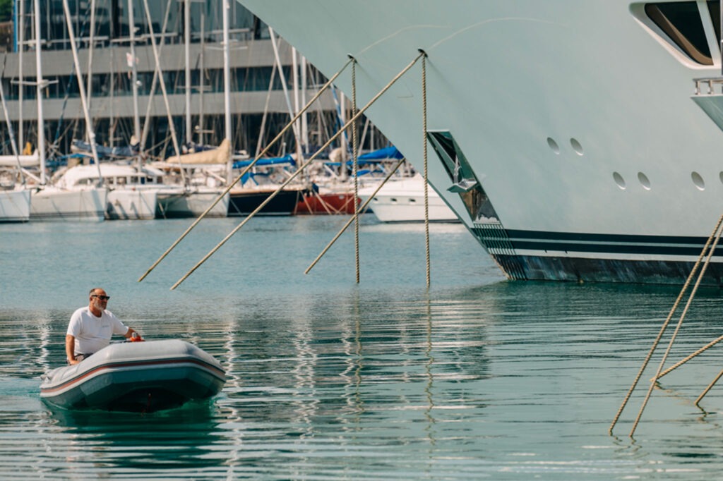 Rubber boat sailing Genova Waterfront Marina